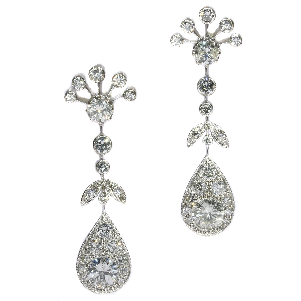 Vintage long pendent platinum cocktail ear jewels abundantly set with diamonds